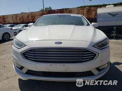 Piąte zdjęcie samochodu w środku: 2017 FORD FUSION SE HYBRID VIN:3FA6P0LU7HR409277 - miniatura