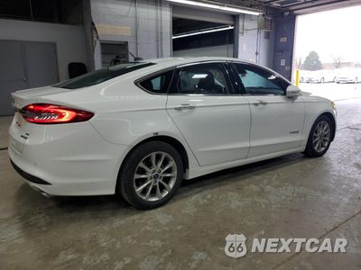 Trzecie zdjęcie samochodu z tyłu: 2017 FORD FUSION SE HYBRID VIN:3FA6P0LU9HR410057 - miniatura