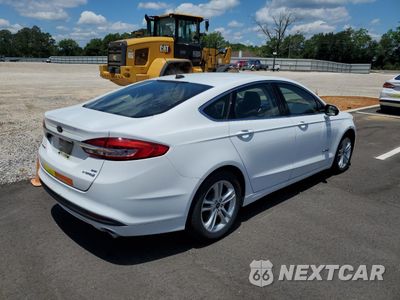 Trzecie zdjęcie samochodu z tyłu: 2018 FORD FUSION SE HYBRID VIN:3FA6P0LU8JR163524 - miniatura