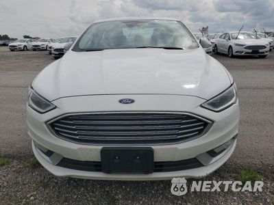 Piąte zdjęcie samochodu w środku: 2017 FORD FUSION SE HYBRID VIN:3FA6P0LUXHR409452 - miniatura
