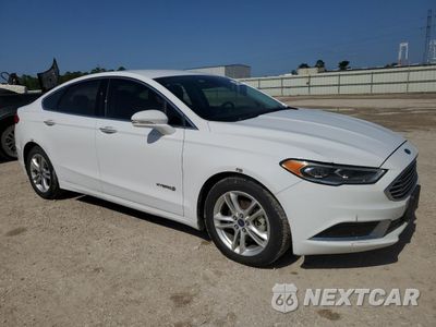 Czwarte zdjęcie samochodu z boku: 2018 FORD FUSION SE HYBRID VIN:3FA6P0LUXJR171639 - miniatura