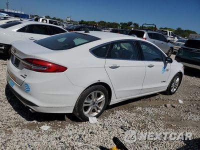 Trzecie zdjęcie samochodu z tyłu: 2018 FORD FUSION SE HYBRID VIN:3FA6P0LUXJR163511 - miniatura