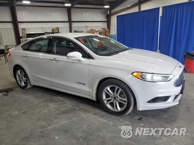 Czwarte zdjęcie samochodu z boku: 2018 FORD FUSION SE HYBRID VIN:3FA6P0LU6JR178474 - miniatura