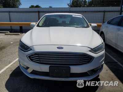 Piąte zdjęcie samochodu w środku: 2017 FORD FUSION SE HYBRID VIN:3FA6P0LU6HR408959 - miniatura