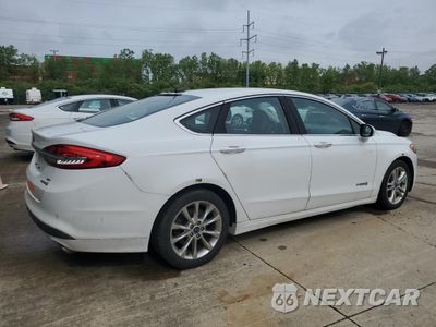 Trzecie zdjęcie samochodu z tyłu: 2018 FORD FUSION SE HYBRID VIN:3FA6P0LU2JR118823 - miniatura