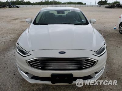 Piąte zdjęcie samochodu w środku: 2017 FORD FUSION SE HYBRID VIN:3FA6P0LUXHR409340 - miniatura