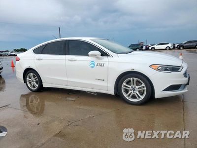 Czwarte zdjęcie samochodu z boku: 2018 FORD FUSION SE HYBRID VIN:3FA6P0LU1JR118795 - miniatura
