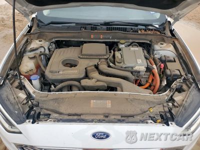 Zdjęcie 11 z 13 samochodu: 2018 FORD FUSION SE HYBRID VIN:3FA6P0LU6JR261600 - miniatura