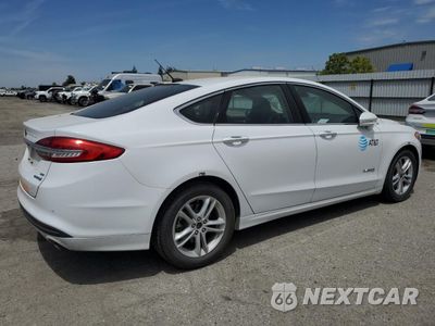 Trzecie zdjęcie samochodu z tyłu: 2018 FORD FUSION SE HYBRID VIN:3FA6P0LUXJR171804 - miniatura