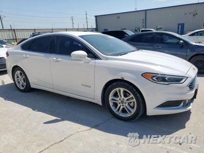 Czwarte zdjęcie samochodu z boku: 2018 FORD FUSION SE HYBRID VIN:3FA6P0LU4JR198321 - miniatura