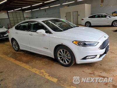 Czwarte zdjęcie samochodu z boku: 2017 FORD FUSION SE HYBRID VIN:3FA6P0LU6HR410033 - miniatura
