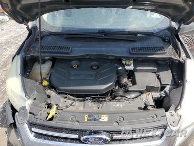 Zdjęcie 12 z 15 samochodu: 2014 FORD ESCAPE TITANIUM VIN:1FMCU0J98EUE55110 - miniatura