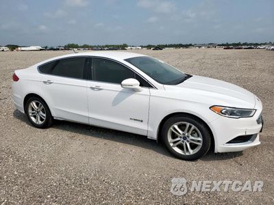 Czwarte zdjęcie samochodu z boku: 2018 FORD FUSION SE HYBRID VIN:3FA6P0LU1JR171741 - miniatura