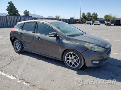 Czwarte zdjęcie samochodu z boku: 2015 FORD FOCUS SE VIN:1FADP3K23FL364018 - miniatura