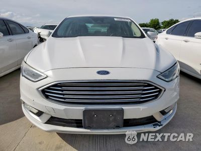 Piąte zdjęcie samochodu w środku: 2017 FORD FUSION SE HYBRID VIN:3FA6P0LUXHR408981 - miniatura