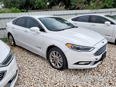 Czwarte zdjęcie samochodu z boku: 2017 FORD FUSION SE HYBRID VIN:3FA6P0LU9HR409135 - miniatura