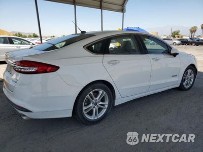 Trzecie zdjęcie samochodu z tyłu: 2018 FORD FUSION SE HYBRID VIN:3FA6P0LU4JR129953 - miniatura