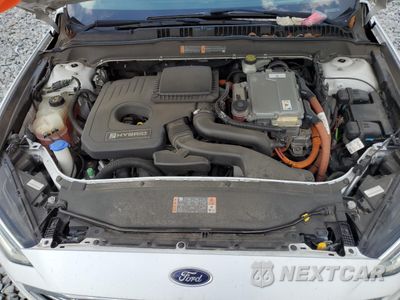 Zdjęcie 11 z 12 samochodu: 2017 FORD FUSION SE HYBRID VIN:3FA6P0LU7HR409571 - miniatura