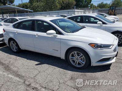 Czwarte zdjęcie samochodu z boku: 2018 FORD FUSION SE HYBRID VIN:3FA6P0LU7JR118865 - miniatura