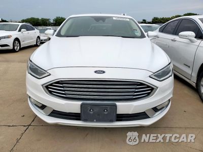 Piąte zdjęcie samochodu w środku: 2017 FORD FUSION SE HYBRID VIN:3FA6P0LU6HR409447 - miniatura