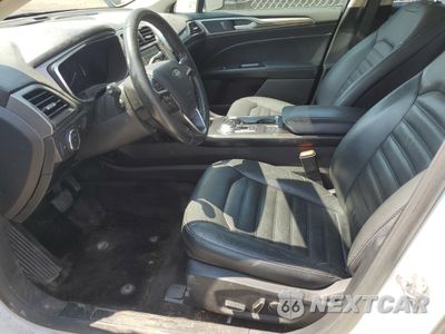 Zdjęcie 7 z 12 samochodu: 2017 FORD FUSION SE HYBRID VIN:3FA6P0LU5HR409715 - miniatura