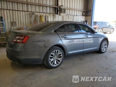 Trzecie zdjęcie samochodu z tyłu: 2014 FORD TAURUS LIMITED VIN:1FAHP2F87EG167791 - miniatura