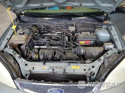 Zdjęcie 11 z 13 samochodu: 2005 FORD FOCUS ZXW VIN:1FAFP36N05W150694 - miniatura