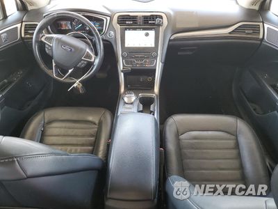 Zdjęcie 8 z 13 samochodu: 2017 FORD FUSION SE HYBRID VIN:3FA6P0LU5HR409696 - miniatura