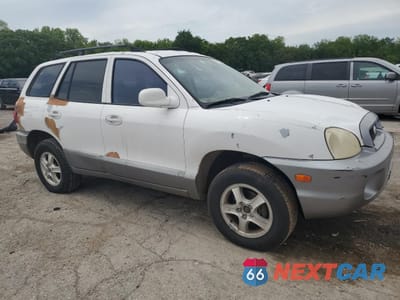 Czwarte zdjęcie samochodu z boku: 2002 HYUNDAI SANTA FE GLS VIN:KM8SC13D92U292632 - miniatura