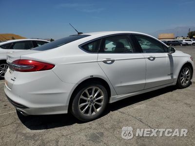 Trzecie zdjęcie samochodu z tyłu: 2017 FORD FUSION SE HYBRID VIN:3FA6P0LU7HR409375 - miniatura
