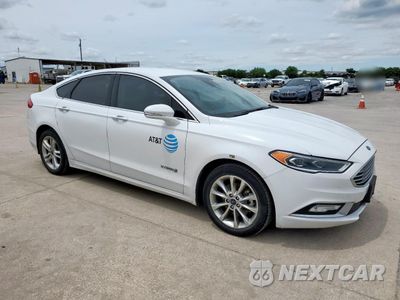 Czwarte zdjęcie samochodu z boku: 2017 FORD FUSION SE HYBRID VIN:3FA6P0LU0HR409217 - miniatura