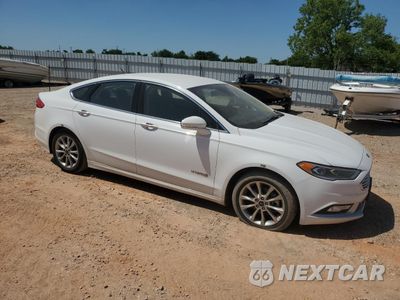Czwarte zdjęcie samochodu z boku: 2017 FORD FUSION SE HYBRID VIN:3FA6P0LU9HR409121 - miniatura