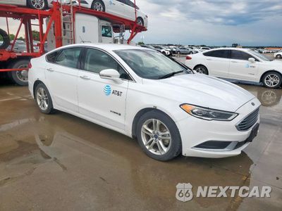 Czwarte zdjęcie samochodu z boku: 2018 FORD FUSION SE HYBRID VIN:3FA6P0LUXJR172063 - miniatura