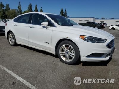 Czwarte zdjęcie samochodu z boku: 2018 FORD FUSION SE HYBRID VIN:3FA6P0LU4JR278735 - miniatura