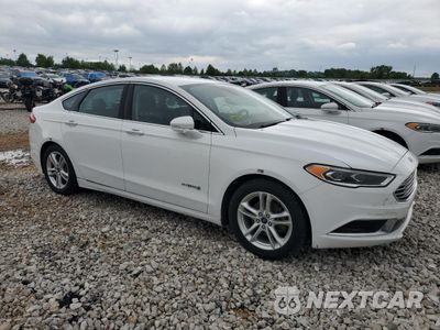 Czwarte zdjęcie samochodu z boku: 2018 FORD FUSION SE HYBRID VIN:3FA6P0LU8JR171929 - miniatura