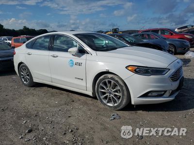 Czwarte zdjęcie samochodu z boku: 2017 FORD FUSION SE HYBRID VIN:3FA6P0LU2HR409512 - miniatura