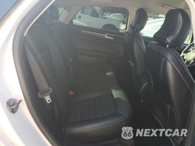 Zdjęcie 10 z 13 samochodu: 2018 FORD FUSION SE HYBRID VIN:3FA6P0LU7JR152451 - miniatura