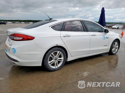 Trzecie zdjęcie samochodu z tyłu: 2018 FORD FUSION SE HYBRID VIN:3FA6P0LU9JR171650 - miniatura