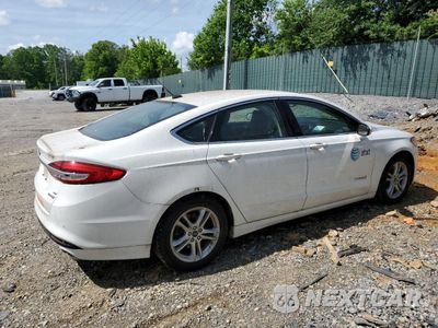 Trzecie zdjęcie samochodu z tyłu: 2018 FORD FUSION SE HYBRID VIN:3FA6P0LUXJR129925 - miniatura