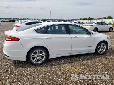 Trzecie zdjęcie samochodu z tyłu: 2018 FORD FUSION SE HYBRID VIN:3FA6P0LU2JR118756 - miniatura