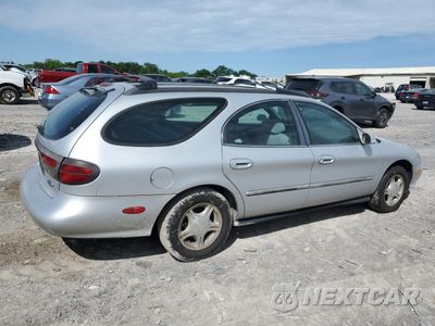 Trzecie zdjęcie samochodu z tyłu: 1999 FORD TAURUS SE VIN:1FAFP58UXXA313979 - miniatura