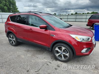 Czwarte zdjęcie samochodu z boku: 2017 FORD ESCAPE SE VIN:1FMCU9GD3HUB00754 - miniatura