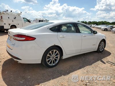 Trzecie zdjęcie samochodu z tyłu: 2017 FORD FUSION SE HYBRID VIN:3FA6P0LU8HR409630 - miniatura