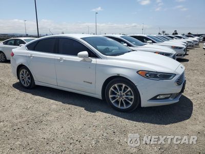 Czwarte zdjęcie samochodu z boku: 2017 FORD FUSION SE HYBRID VIN:3FA6P0LU1HR409162 - miniatura