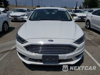 Piąte zdjęcie samochodu w środku: 2018 FORD FUSION SE HYBRID VIN:3FA6P0LU3JR172115 - miniatura