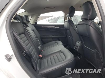 Zdjęcie 10 z 13 samochodu: 2018 FORD FUSION SE HYBRID VIN:3FA6P0LU4JR171569 - miniatura