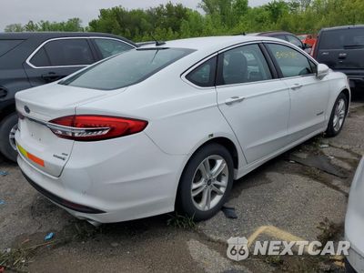 Trzecie zdjęcie samochodu z tyłu: 2018 FORD FUSION SE HYBRID VIN:3FA6P0LU6JR278753 - miniatura