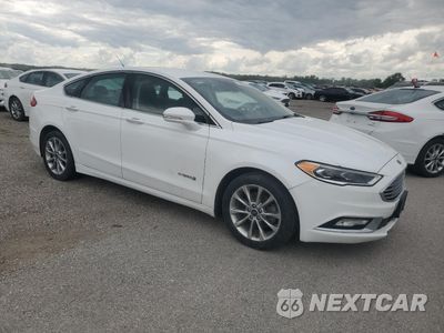 Czwarte zdjęcie samochodu z boku: 2017 FORD FUSION SE HYBRID VIN:3FA6P0LU7HR409313 - miniatura