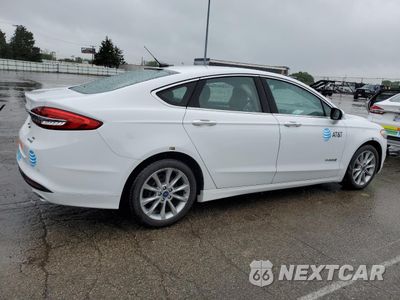 Trzecie zdjęcie samochodu z tyłu: 2017 FORD FUSION SE HYBRID VIN:3FA6P0LU5HR410072 - miniatura