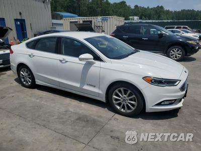 Czwarte zdjęcie samochodu z boku: 2017 FORD FUSION SE HYBRID VIN:3FA6P0LU4HR409415 - miniatura